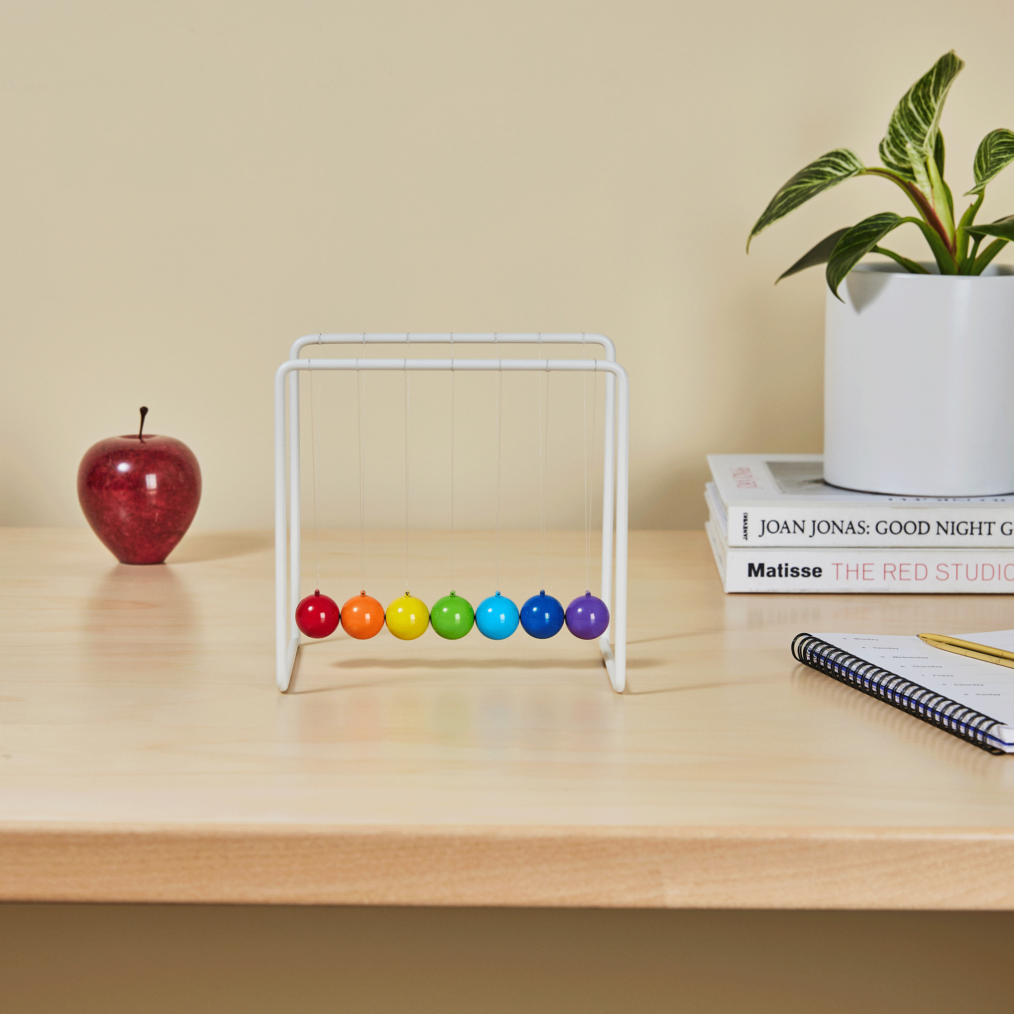 Colorful Newton’s Cradle Desk Toy by MoMA – Gradient Pendulum