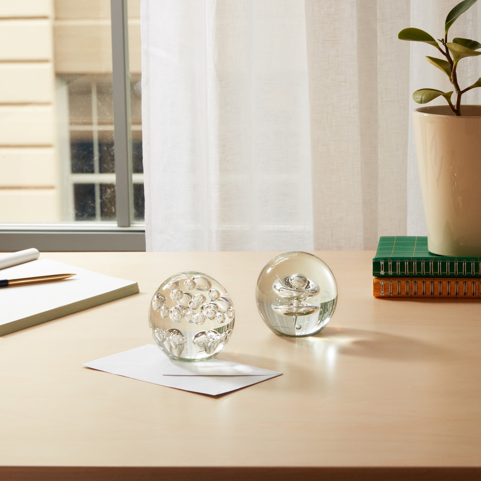 MoMA Exclusive Handmade Glass Paperweight with Spiral Rings – Desk Art Decor