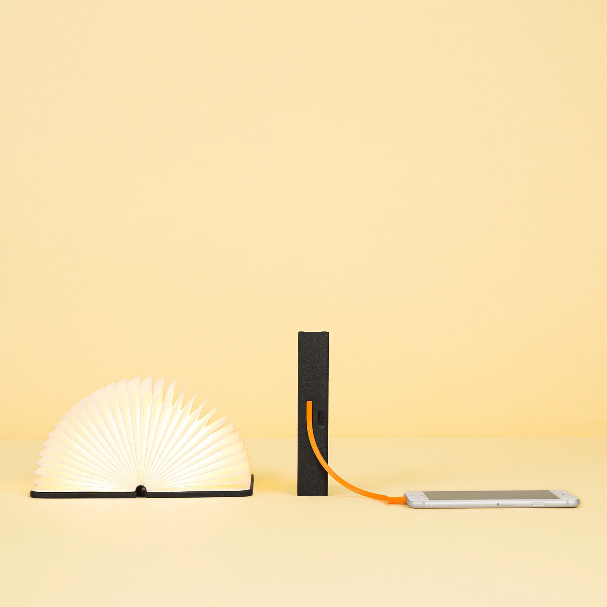 Lumio+ Mini Portable LED Light with Phone Charger - Black/Orange